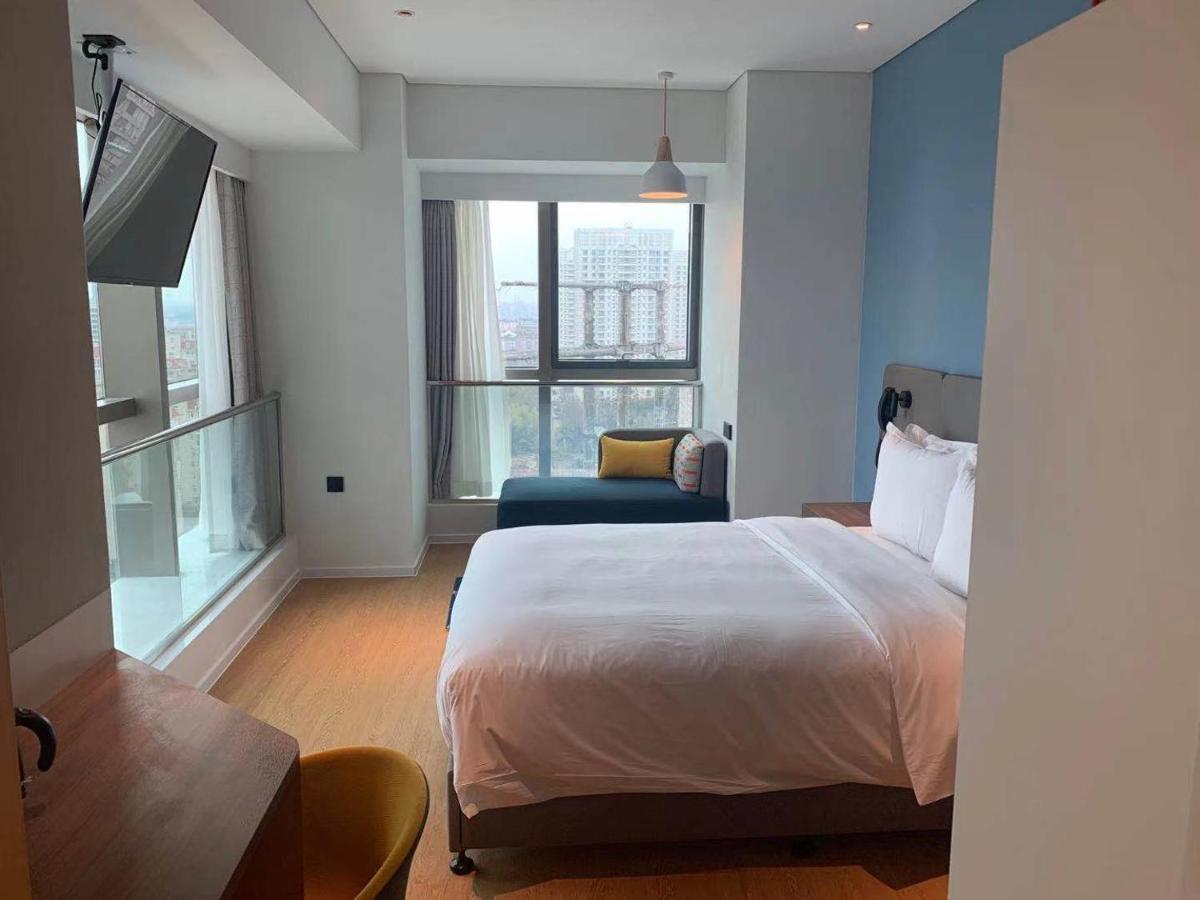 Holiday Inn Express Shanghai Baoyang By Ihg מראה חיצוני תמונה